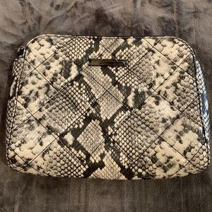 Aldo Clutch Purse
Faux snake leather